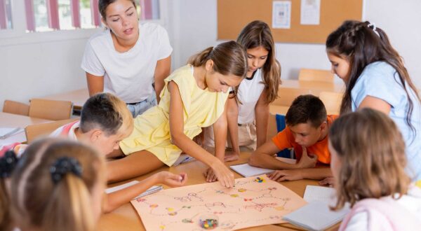 Students play a game as part of a Social Thinking group in school.