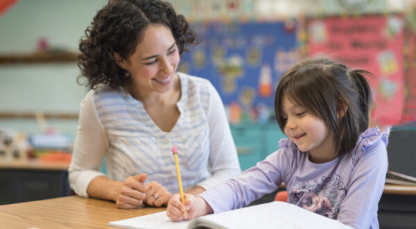 Reading instructor and student working on a lesson