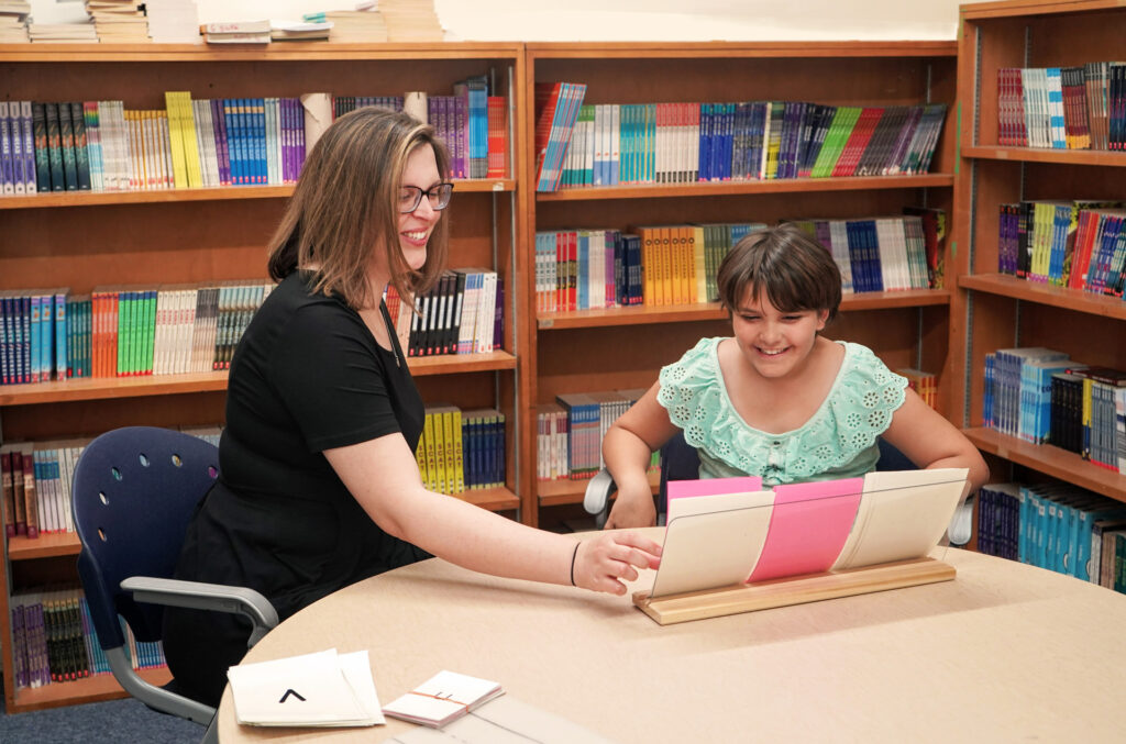 A special educator works with a student on an Orton-Gillingham lesson