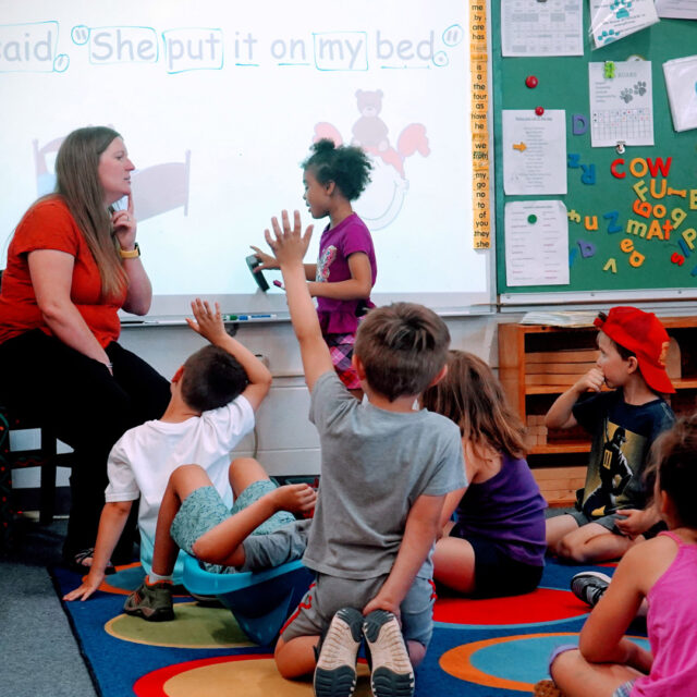 A teacher at Vergennes Union Elementary School conducts an Orton-Gillingham lesson with her students.