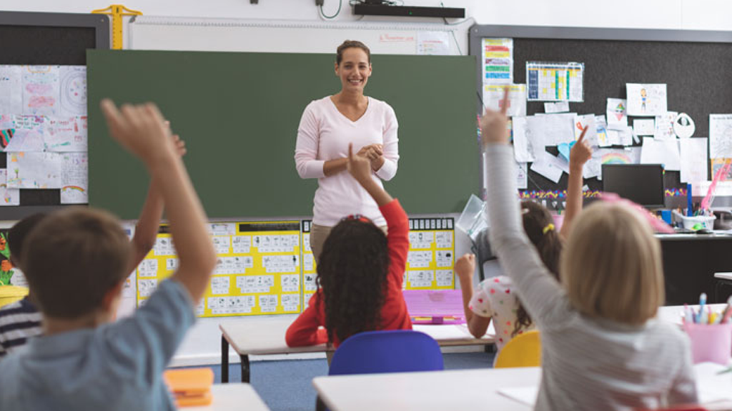 teacher in front of a class of students
